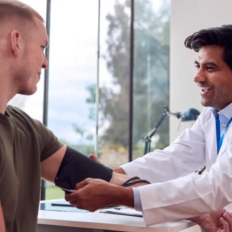 Doctor consulting male patient - Gentle Procedures UK men’s health clinic